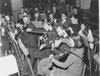 Cannock & Distrct Light Orchestra, rehearsing in the dining hall.  Mark Clark - oboe, Philip Leah - flute, violins - Susan Brown ? and Ken Gange ( teacher).